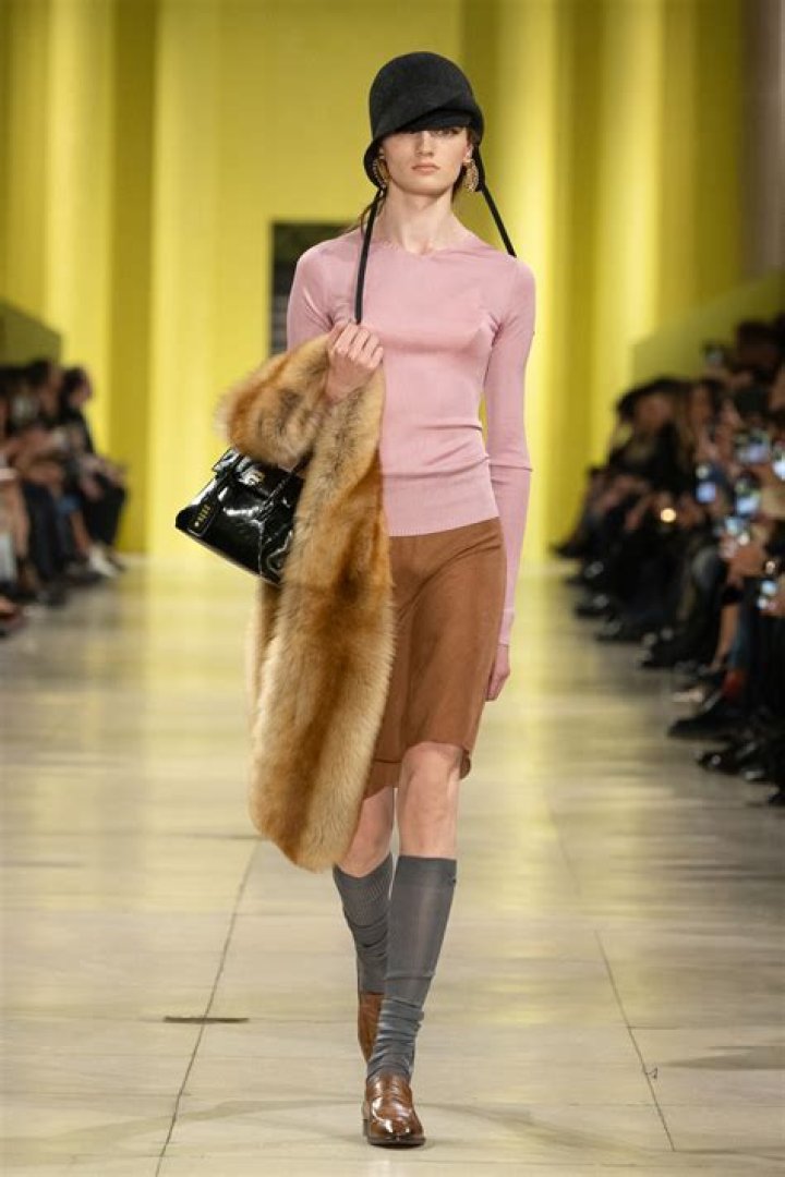 Bella Hadid Rocks Extremely Tiny Crop Top & Bleached Eyebrows on Miu Miu Runway At PFW: Photos