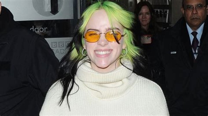 Billie Eilish Rocks A Plaid Mini Skirt & More While Debuting New Clothing Collection