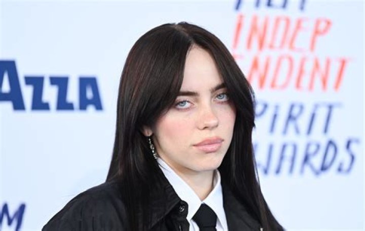 Billie Eilish’s Shoes Go Viral As Fans Can’t Agree What Color They Are — Watch Confusing Video