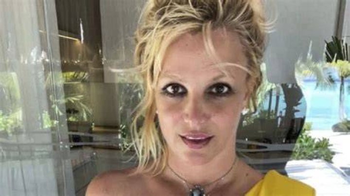 Britney Spears Shares Flirty Pool Day Video in Tiny String Bikini With Manager Benjamin Mallin