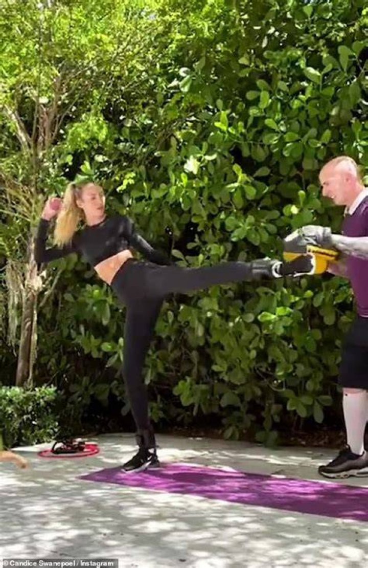 Candice Swanepoel Flaunts Toned Abs While Holding Baby Son 3 Mos. After Giving Birth