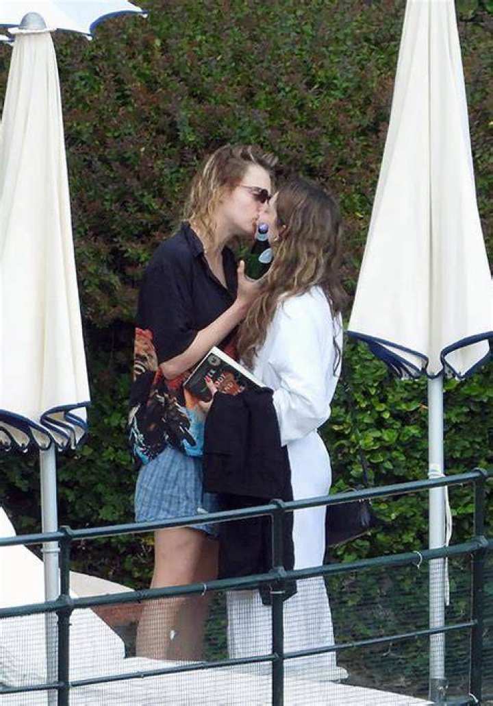 Cara Delevingne Passionately Kisses Singer Minke In Italy: See Steamy Poolside Photos