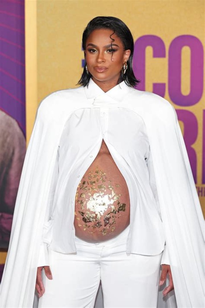 Cardi B Showcases Her Baby Bump In Gorgeous Gold Bikini With Sparkly Chains Cradling Her Belly