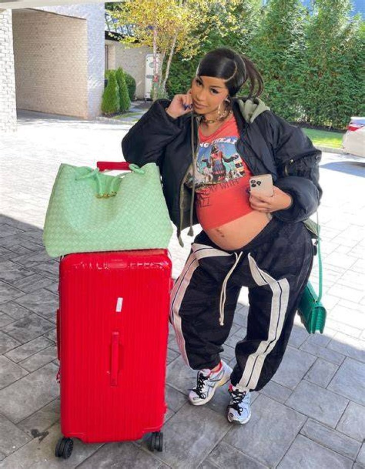 Cardi B Shows Off Baby Bump In A Pink Jumpsuit With Daughter: Video – Hollywood Life