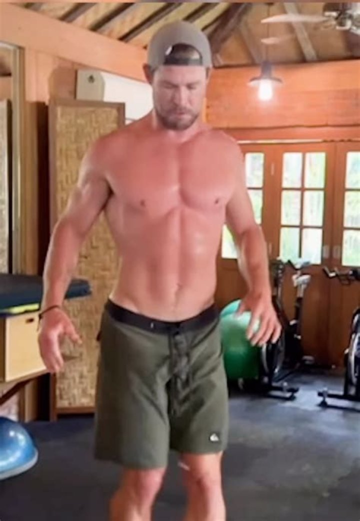 Chris Hemsworth Looks Incredibly Buff In New Shirtless Pics While Vacationing In ‘Paradise’ With Family