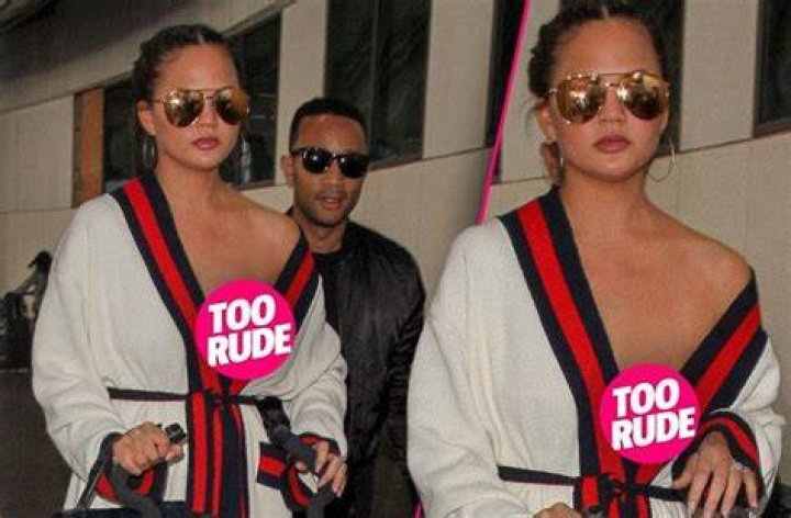 Chrissy Teigen Risks Wardrobe Malfunction In Plunging One-Piece Bathing Suit