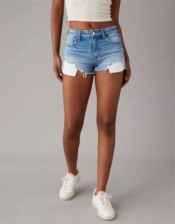 Chrissy Teigen Rocks Lacy Silk Top & High Waisted Short Shorts In Gorgeous New Pics