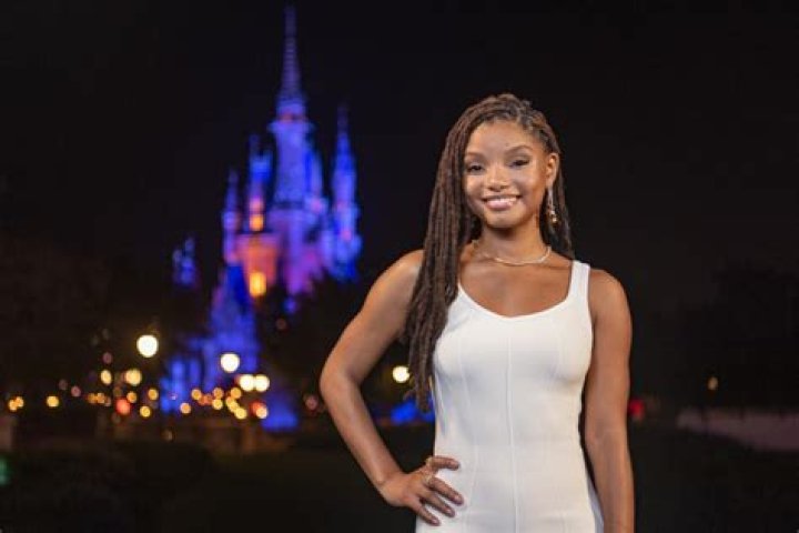 Christina Aguilera, Halle Bailey & More Photos From Disney World’s 50th Anniversary Special