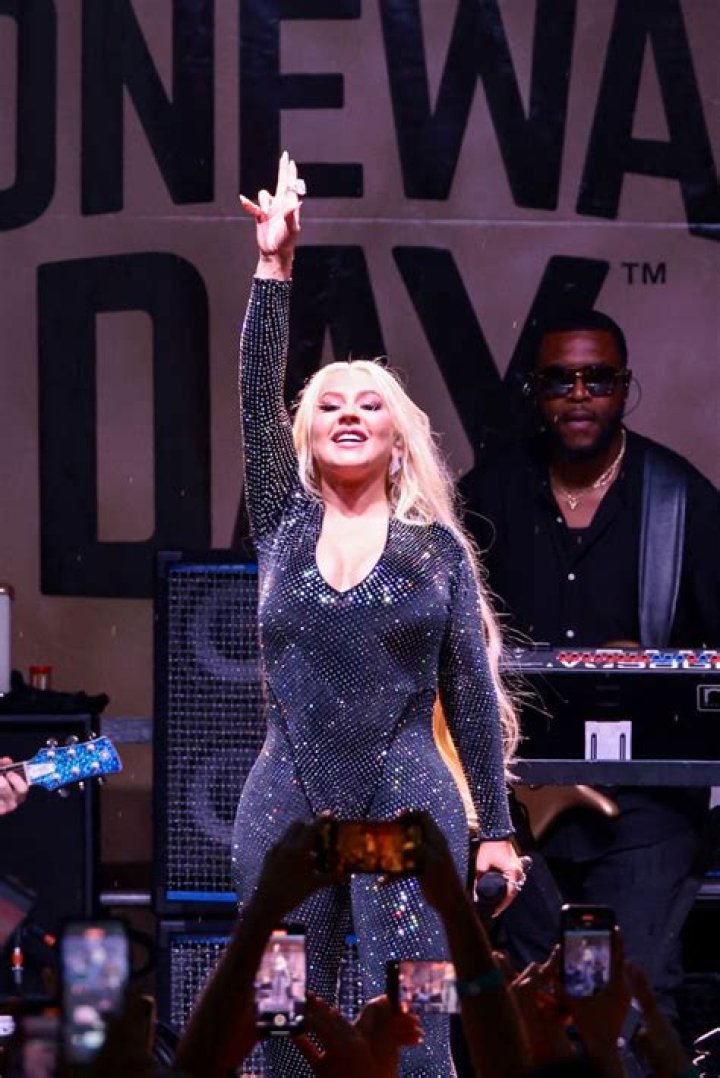 Christina Aguilera Is Glam In Low Cut Black Top As She Performs At The Hollywood Bowl — Photos