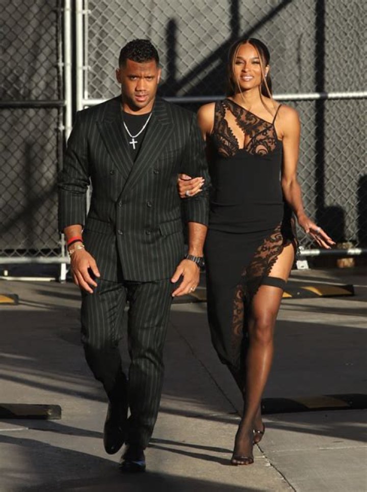 Ciara Rocks High-Slit Lace Dress With Sexy Stockings While Out With Russell Wilson