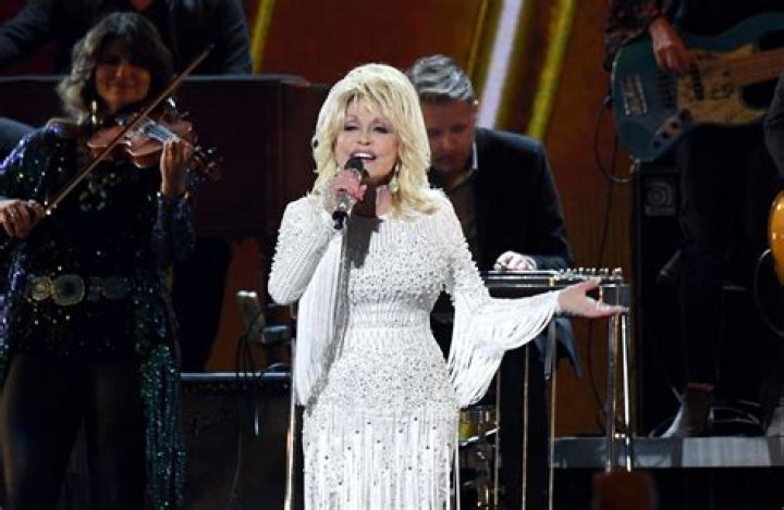 Dolly Parton Backs BLM & Quips: ‘Do We Think Our Little White Asses Are The Only Ones That Matter?’