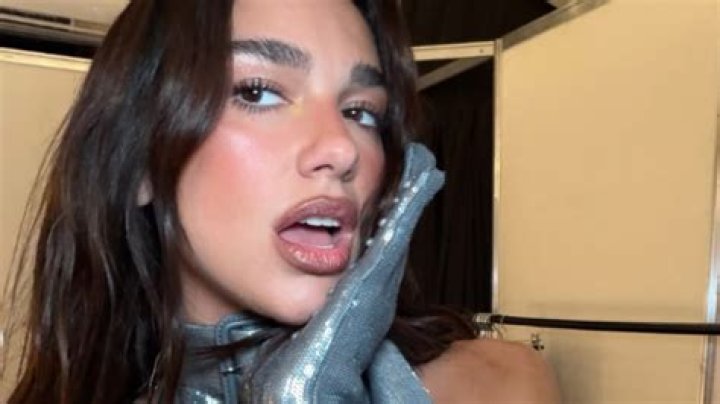 Dua Lipa Rocks A Cutout Bodysuit While Playing Tennis In A New Evian Ad: Watch