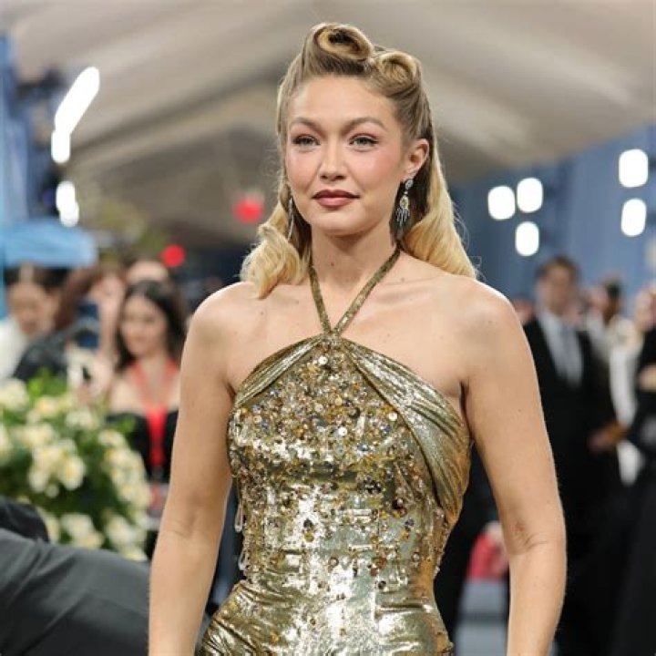 Gigi Hadid’s Plunging Sheer Silver Dress At Paris Fashion Week: Photos – Hollywood Life