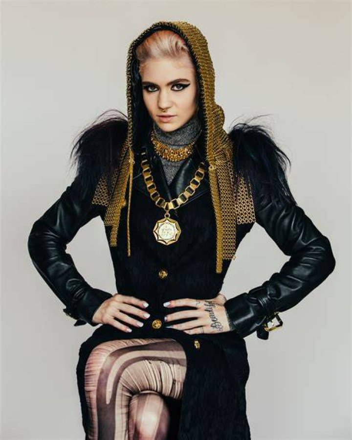 Grimes Shares Wild Throwback Pic From Her Teen Years After Debuting New Makeover