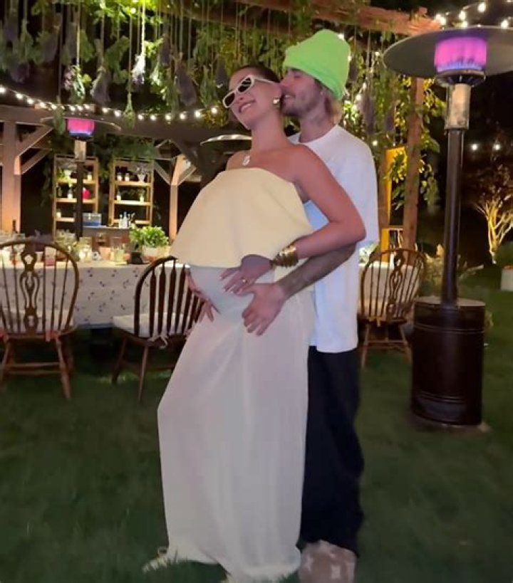 Hailey Bieber Shows Off Growing Baby Bump in White Jumpsuit: Photo