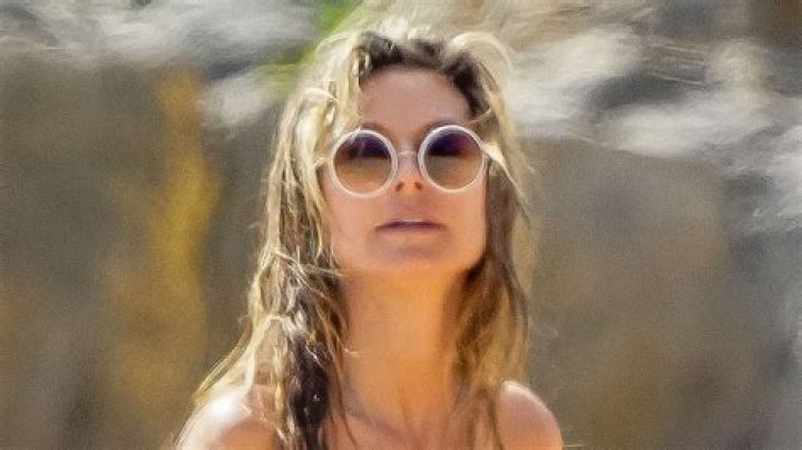 Heidi Klum, 49, Sizzles In White String Bikini As She Takes A Dip On St. Barts Vacation: Photos