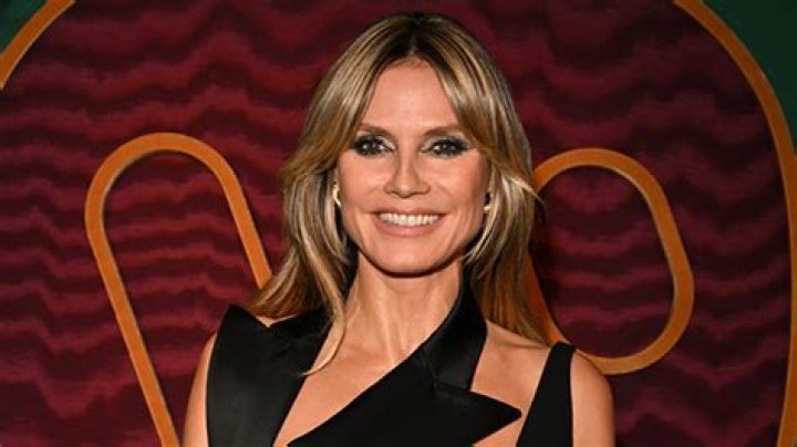 Heidi Klum Sizzles in Plunging Cutout Little Black Dress at Pre-Grammys Party