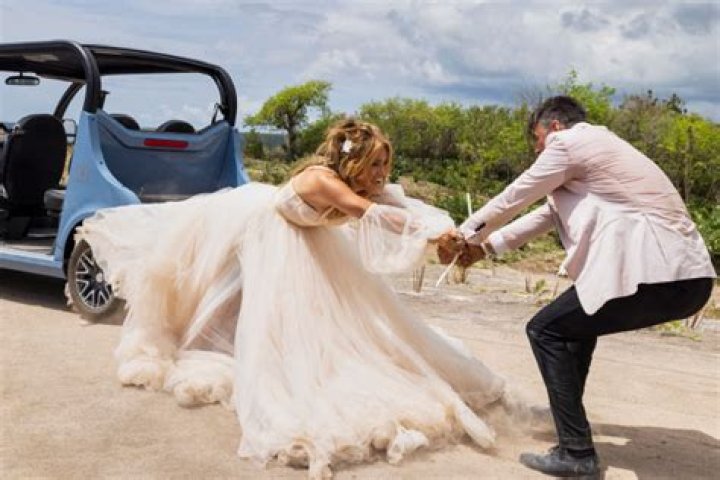 Jennifer Lopez’s Dress Is Caught On A Tire In ‘Shotgun Wedding’: Pics – Hollywood Life