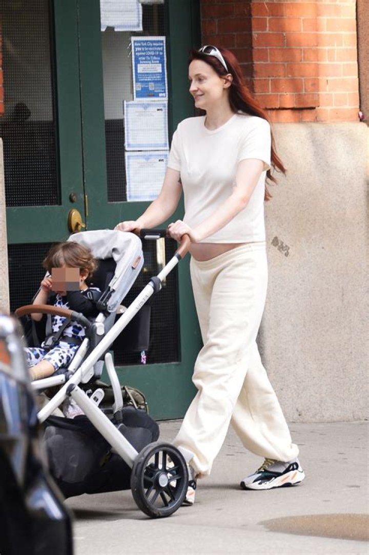 Joe Jonas Heads Out For A Solo Stroll With Daughter Willa, 3 Months, & Shows Off His Buzzcut
