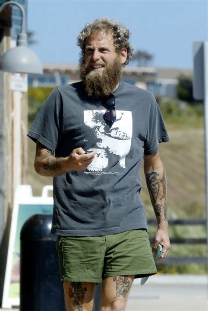 Jonah Hill Looks Unrecognizable With Full Beard & Slicked Back Hair After 40-Lb. Weight Loss