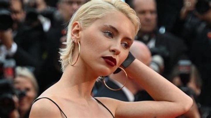 Jude Law’s Daughter Iris, 21, Rocks Fierce Cutout Dress On The Red Carpet