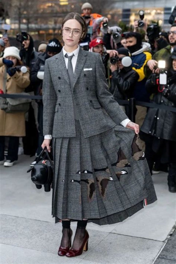 Kamala Harris’ Stepdaughter Ella Emhoff Rocks Black Suit During Balenciaga’s Paris Runway Show