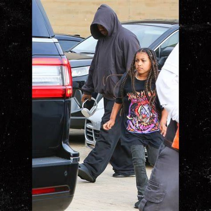 Kanye West & Saint Seen Boarding Plane In Wyoming After Fight With Kim – Hollywood Life