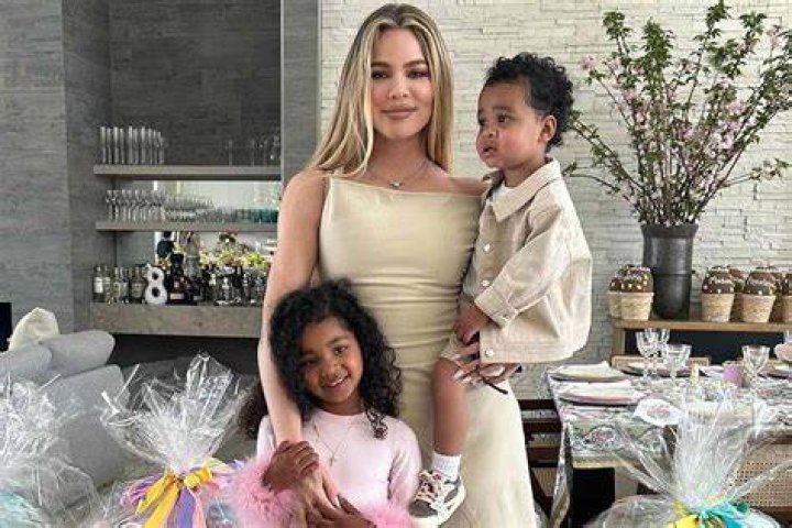 Khloe Kardashian Tans Her Toned Legs By The Pool After Setting Pregnancy Rumors Straight