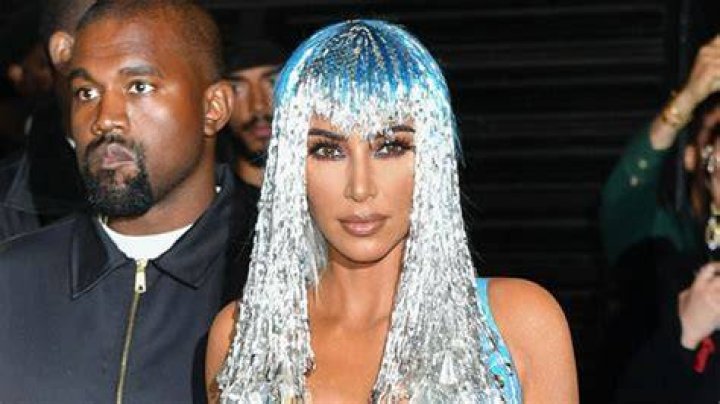 Kim Kardashian Channels Cher With Plunging Latex Dress & Fringe Headpiece At Met Gala After-Party