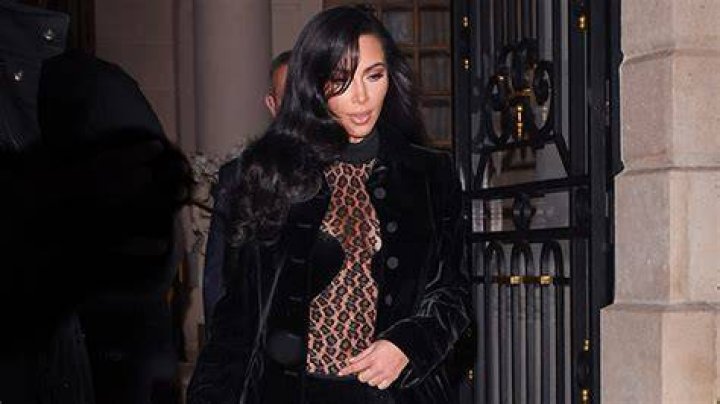 Kim Kardashian Slays In Sheer Leopard Jumpsuit & Shows Off Shorter Hair In Sexy Photos