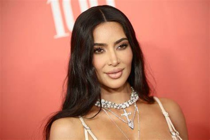 Kim Kardashian Strips Down To A Bikini For Some Sexy ‘Studying In The Sun’ — See Pics