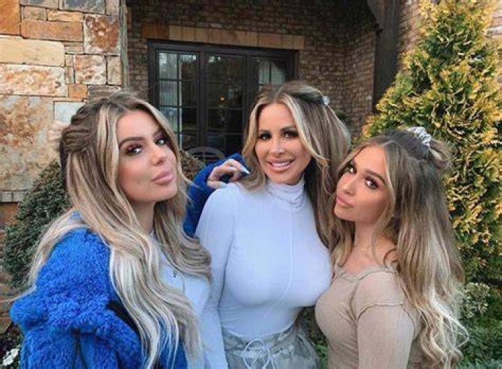 Kim Zolciak Claps Back After Hater Claims She & Daughters Brielle & Ariana Have Fake Teeth — Watch