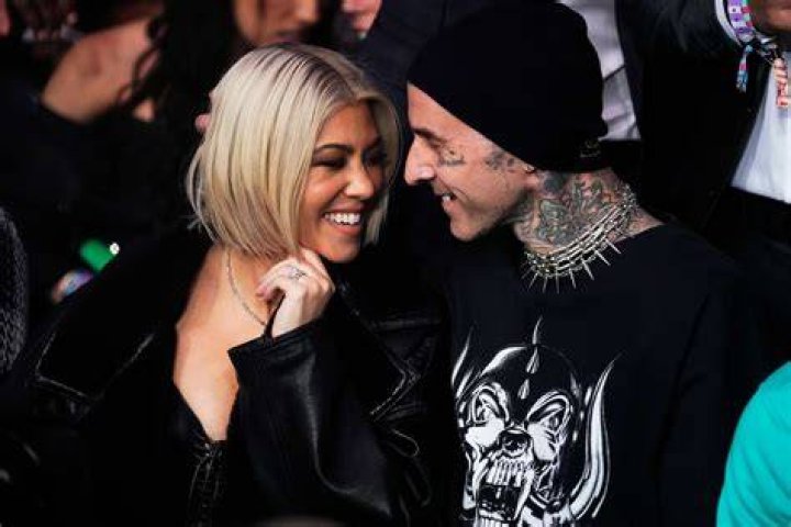 Kourtney Kardashian Cozies Up to Travis Barker Side Stage at Hardcore Concert: Watch