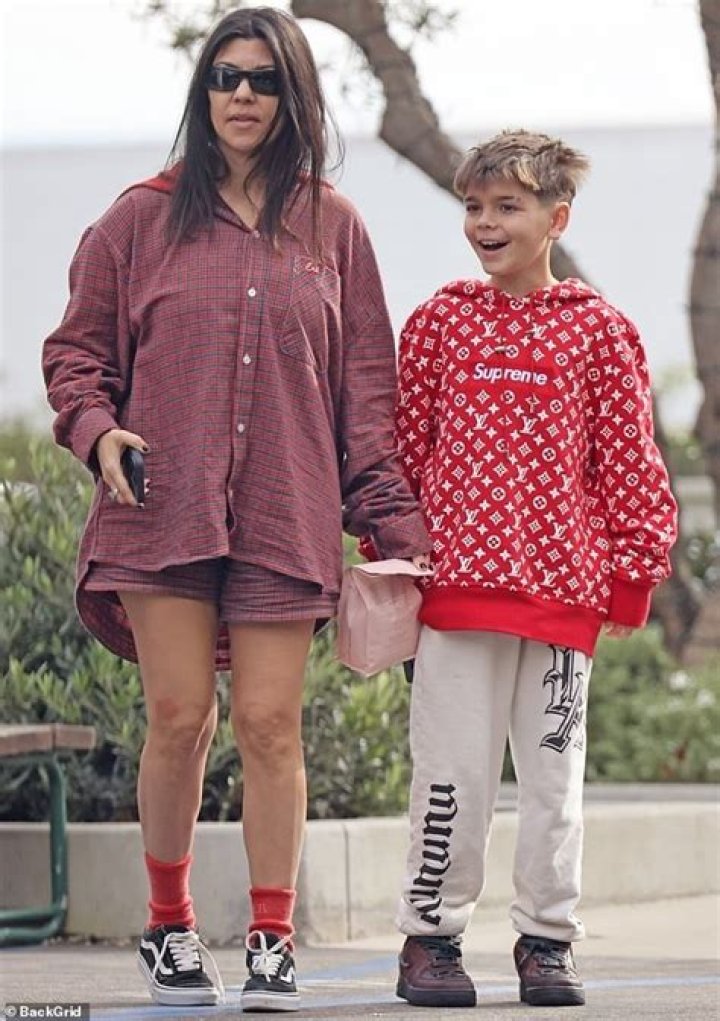 Kourtney Kardashian’s Kids Smother Her In Hugs As She Gets Home From Vacation With Travis Barker