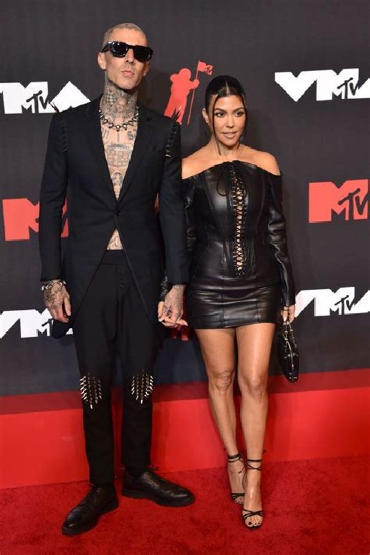 Kourtney Kardashian & Travis Barker Create A ‘White Christmas’ In Calabasas With Imported Snow & Sledding