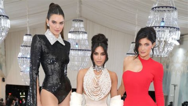 Kylie Jenner & Kim Kardashian Show Up In The Same Red Corset To Dinner: This Was ‘Not Planned’