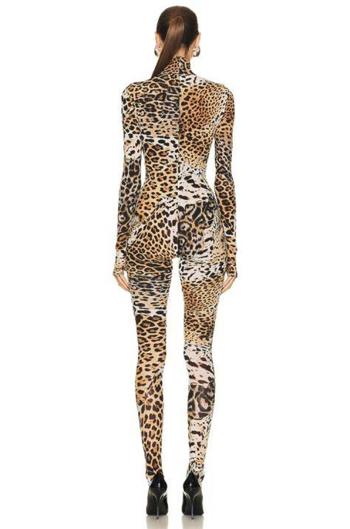 Kylie Jenner Shows Off Insanely Long Blonde Hair As She Slips Into Sexy Animal Print Body Suit – Watch