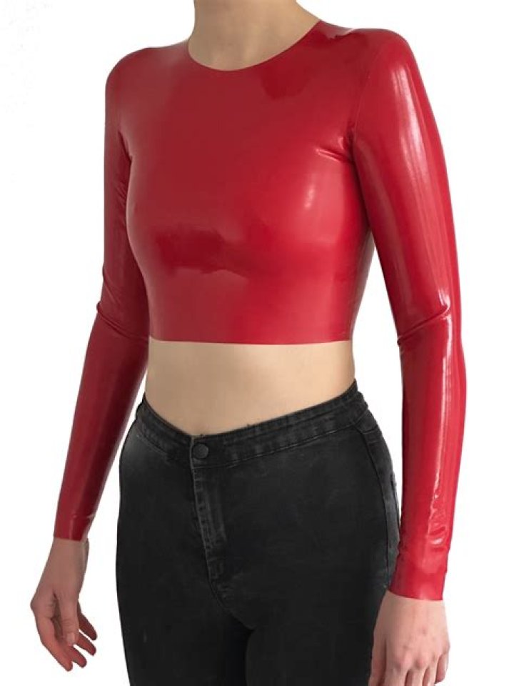 Kylie Jenner Sizzles In Red Crop Top & Matching Pants After Donating $500K To Kids Hospital Lounge