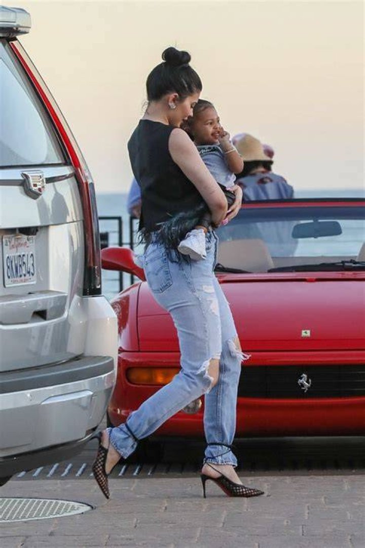 Kylie Jenner & Stormi, 1, Rock Matching Messy Buns In Malibu After Lavish Italian Vacation — Pics