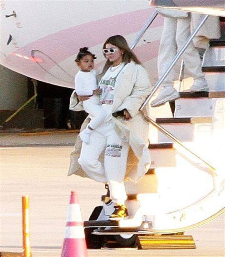 Kylie Jenner & Stormi Webster, 2, Twin In White Sweatsuits While Arriving Home From Winter Getaway — Pic