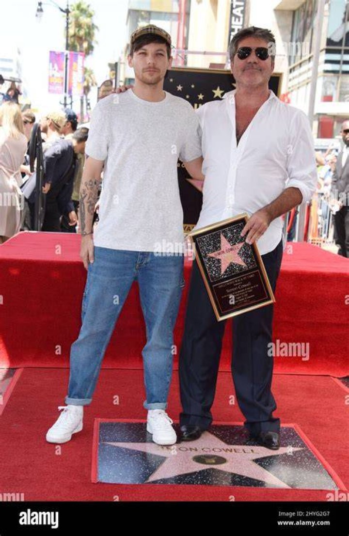 Louis Tomlinson Wants Simon Cowell ‘To Be His Child’s Godfather’