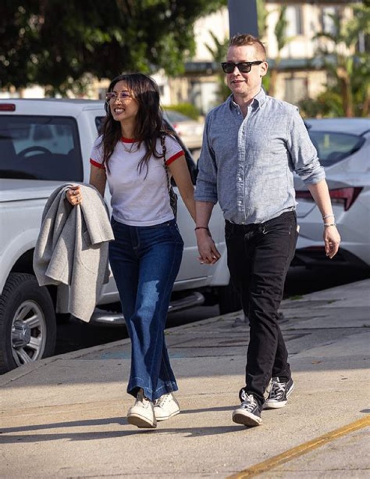 Macaulay Culkin & Brenda Song Hold Hands On Romantic Stroll After Welcoming 2nd Child