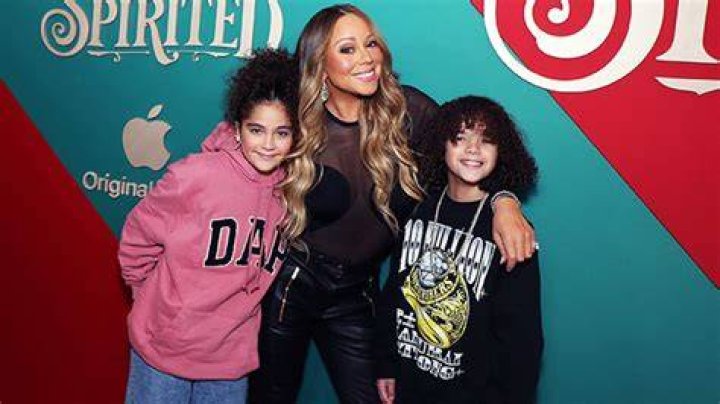 Mariah Carey Is Festive In Plaid Dress For Boxing Day With Twins, 11, & Bryan Tanaka