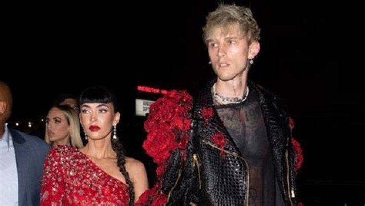 Megan Fox & Fiancé Machine Gun Kelly Snuggle Up At NHL All-Stars Game In Las Vegas — Photos