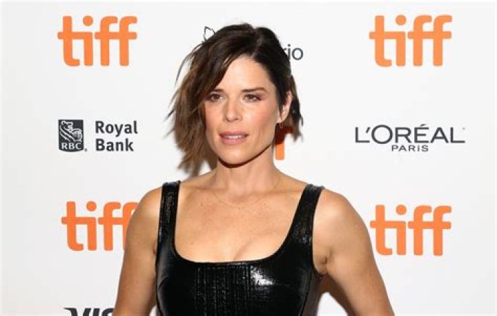 Neve Campbell Reveals She Was Attacked By A Bear On Set & Dragged ‘Through The Forest’