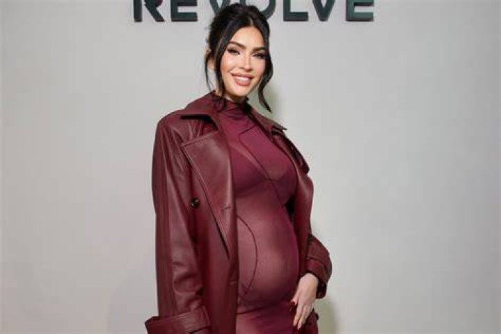 Nikki Bella Shows Off Her Baby Bump In Tight Red Dress To Celebrate ‘Total Bellas’ Premiere