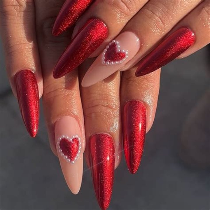 North West Paints Her Entire Face Pink & Red for Valentine’s Day: Watch