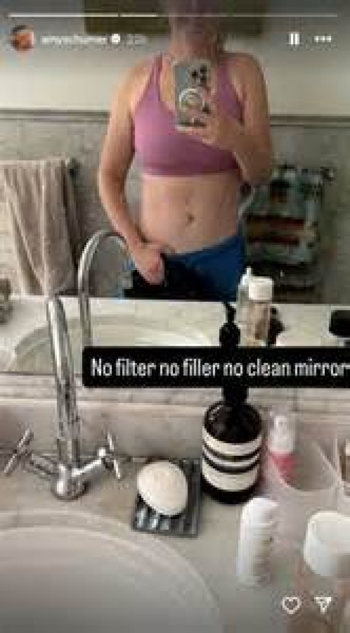 Olivia Culpo Shows Off Toned Abs In Bright Bikini — See Sexy Mirror Selfie