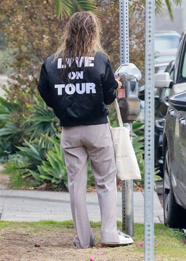 Olivia Wilde Shows Off Her Love For Harry Styles Rocking His Tour Jacket While Running Errands
