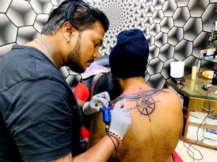 Photos Of The Tattoo Artist – Hollywood Life